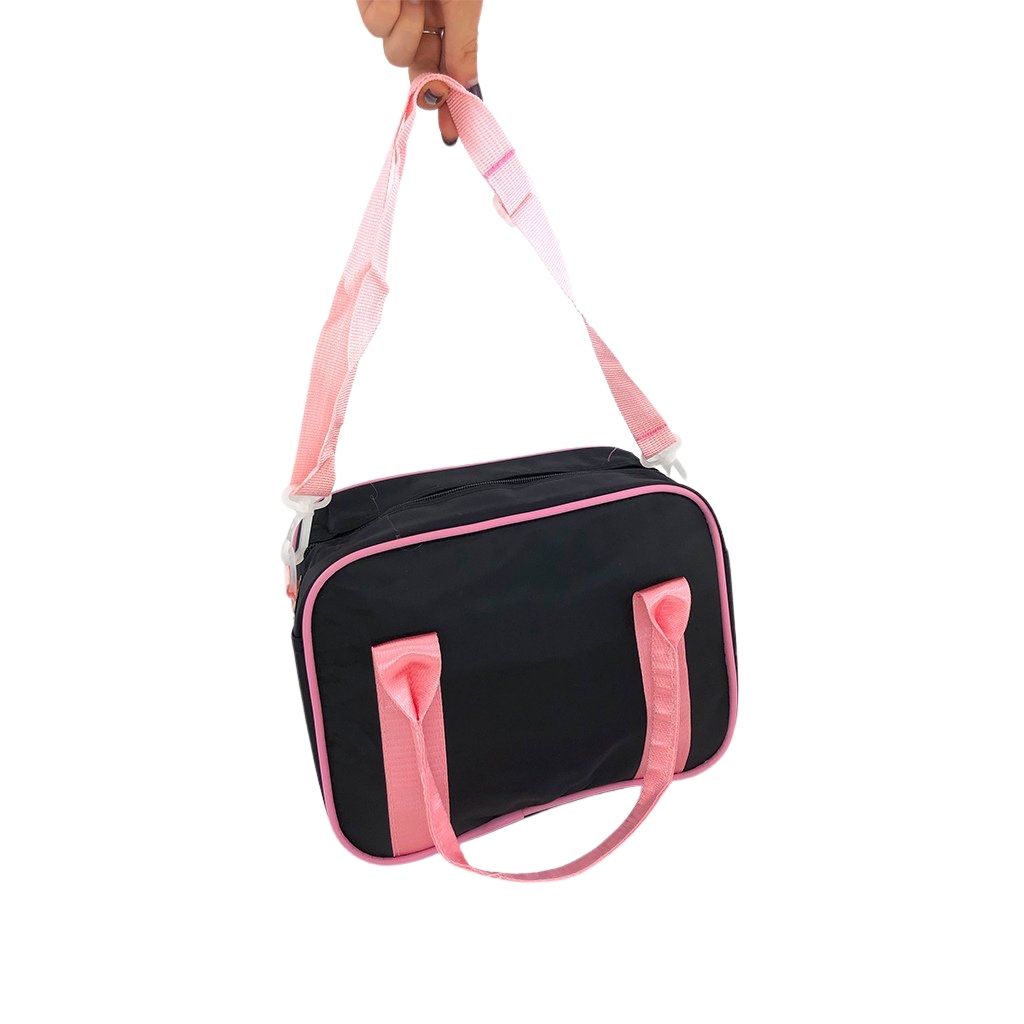 Ballet dance bag back view with special ballet design details, pink handles and detachable strap.