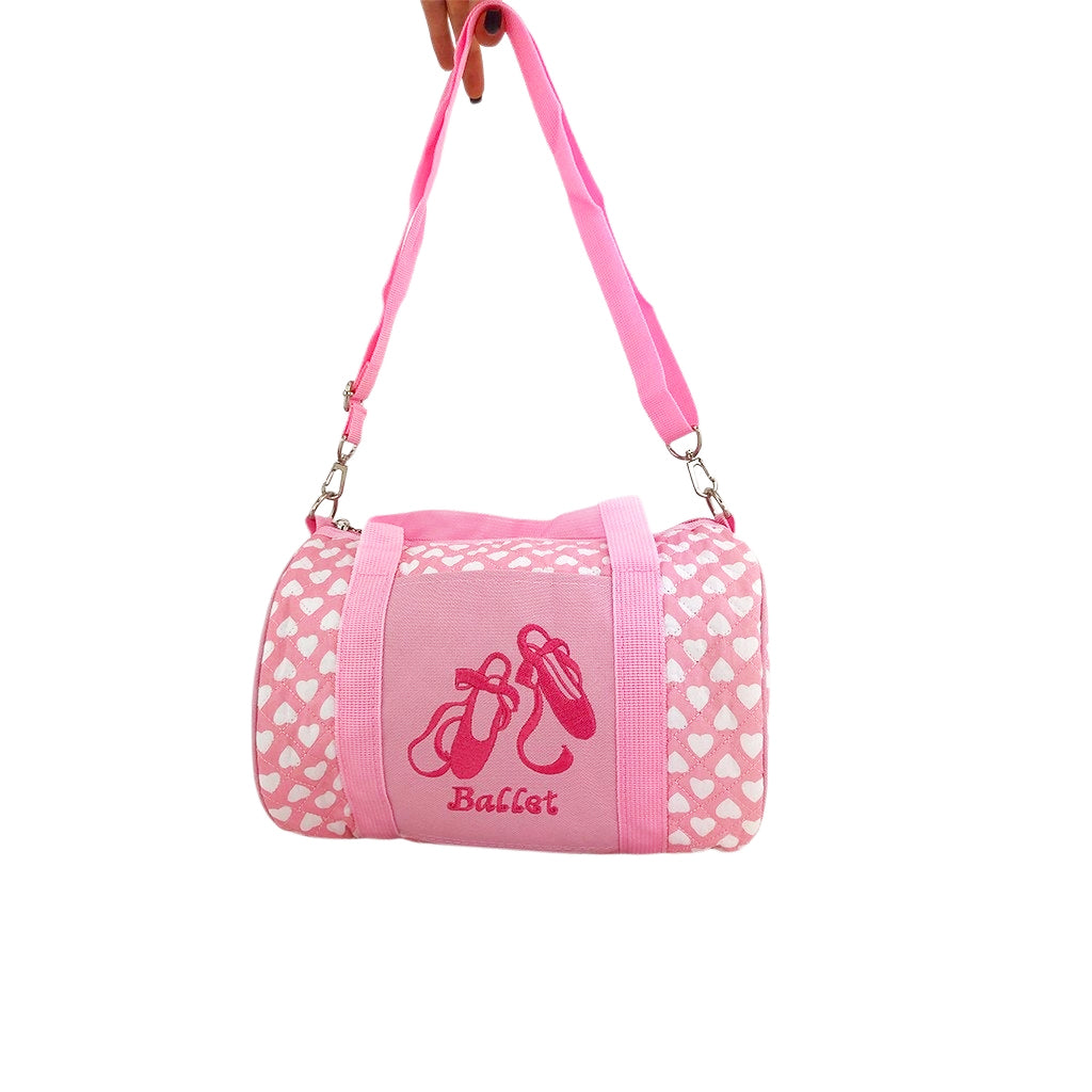 Ballet dance bag front view with special ballet design details, pink handles and detachable strap.