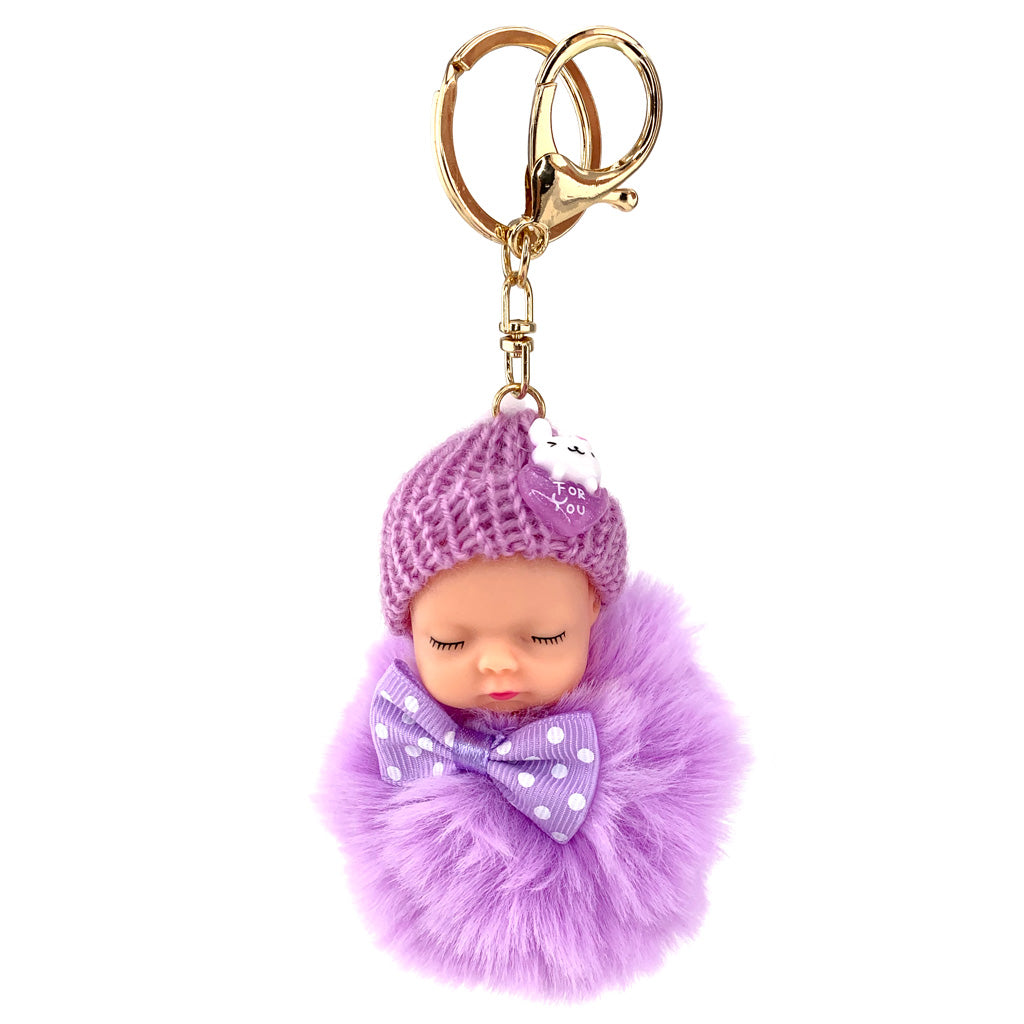 Purple Sleepy Baby Doll Pom Pom keyring with gold coloured hardware