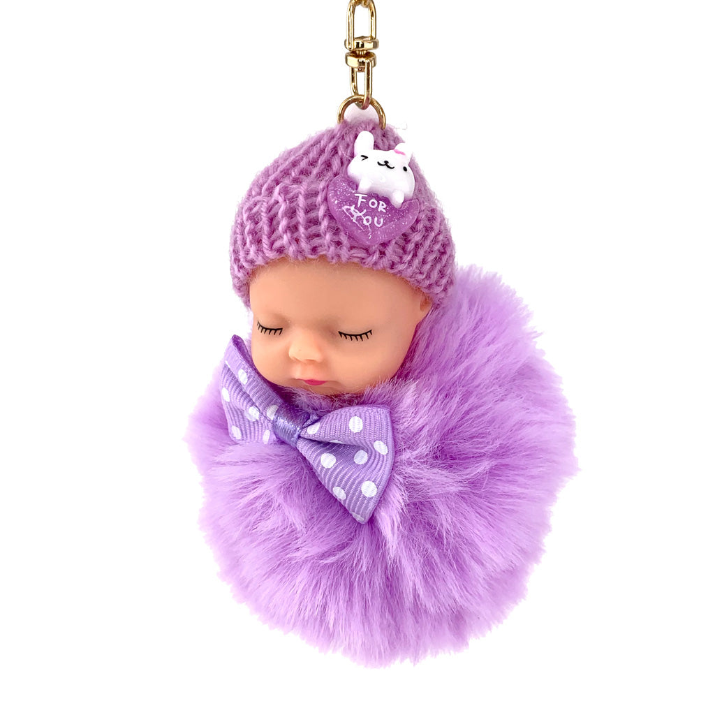 Purple Sleepy Baby Doll Pom Pom keyring with gold coloured hardware