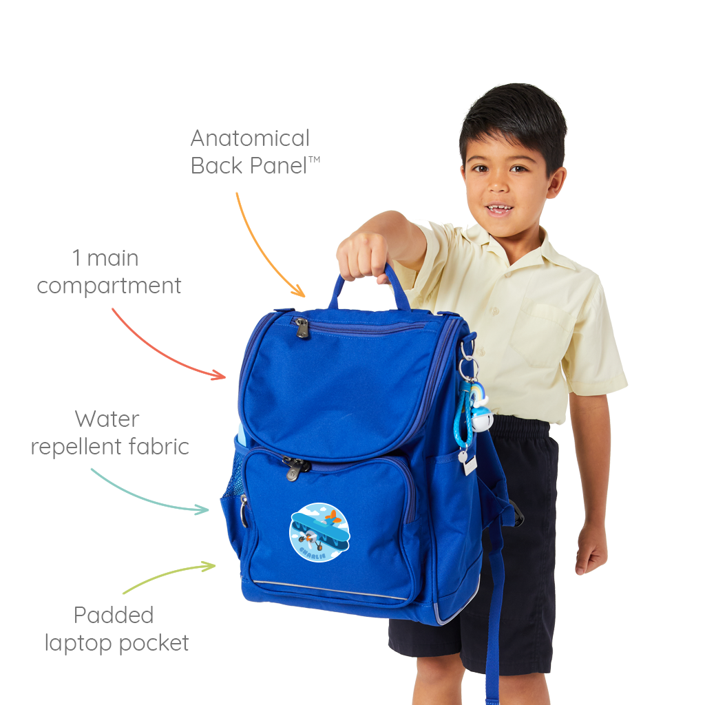 7 year old child model holding up the Harlequin Mighty Tuff-Pack Backpack with personalisation. 4 arrows point towards the bag listing key features of the bag.