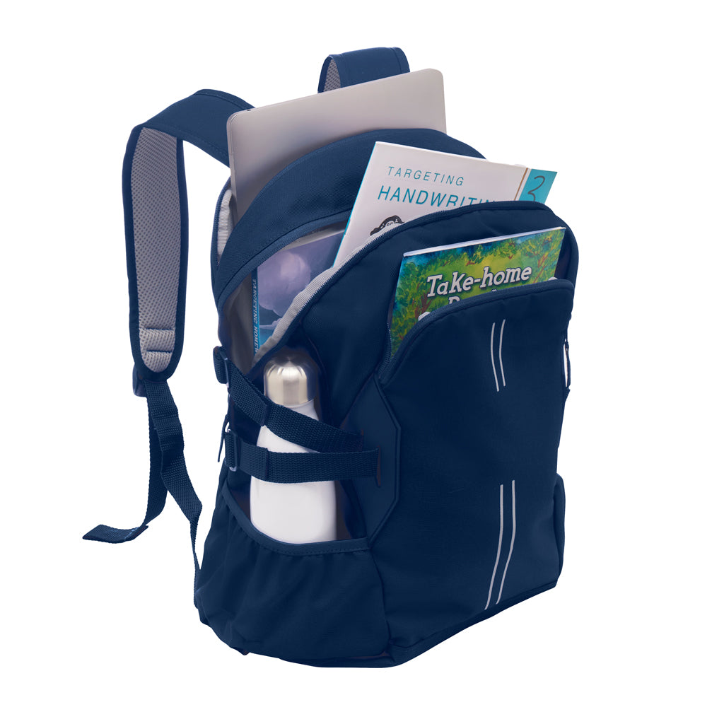 Fully open Quantum Medium Daypack in Navy. Showing the internal back padded laptop pocket and the middle and front pockets. The backpack has been packed with school books and a laptop. A metal bottle is being held in a side pocket.
