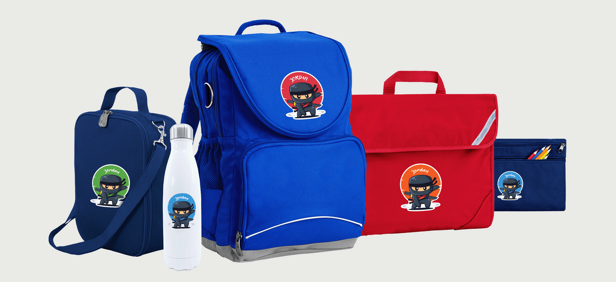 Harlequin backpacks in navy blue and red, personalized with clip art and names, perfect for kids
