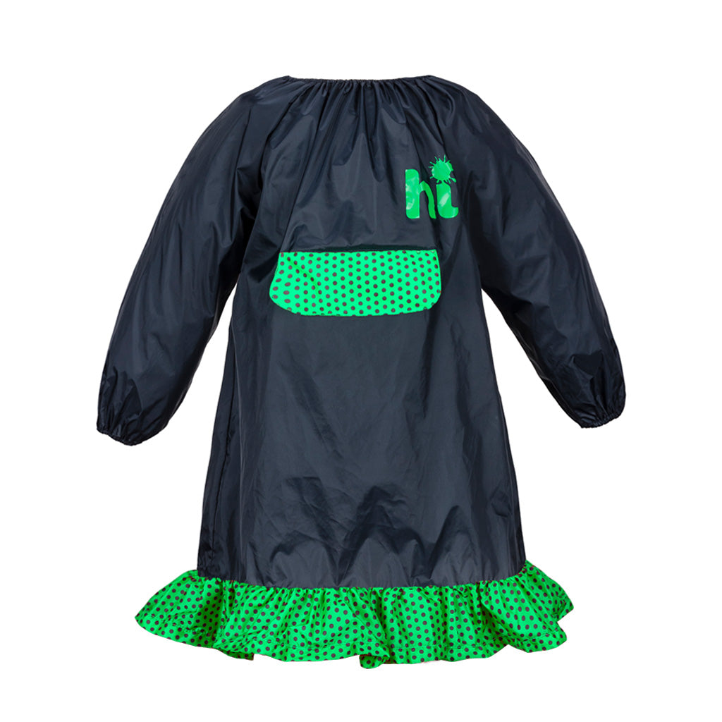 Small art smock with green polka dot frill and front pocket.