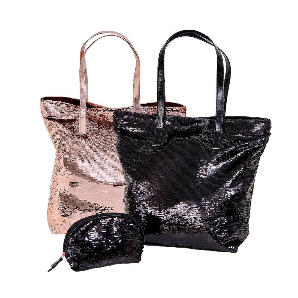 Better Tote Bags Rose gold sequins bag with black sequins bag in front both with a long carry handle, reversible sequins covering the entire front of the bags, matching make up bag also shown.