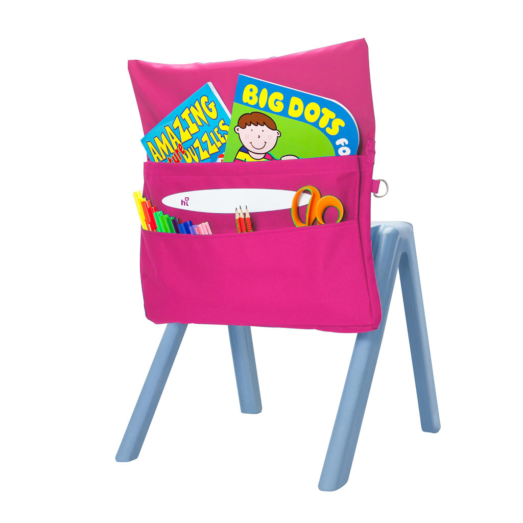 Harlequin hot pink chair bag back angle view displaying two pockets, D ring and name bar