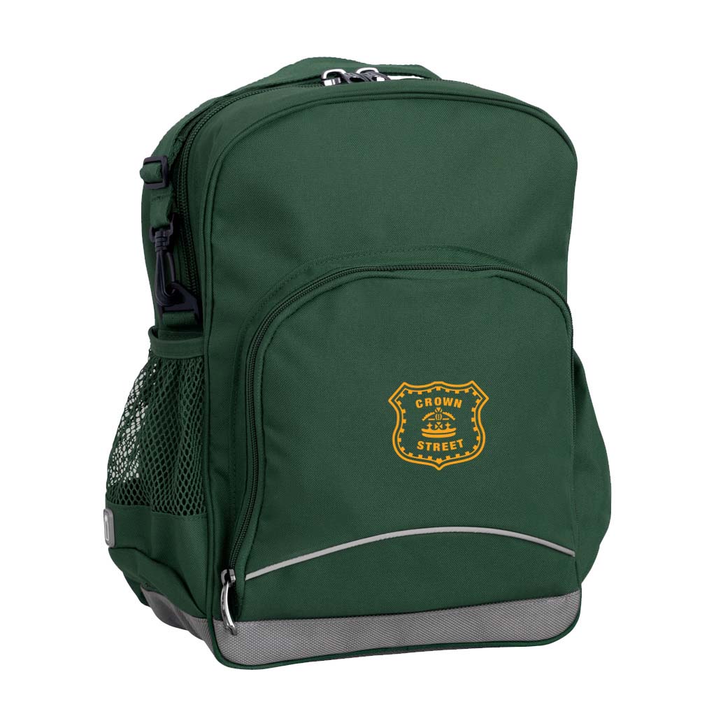 Crown Street Public School front angle view of the Kindy Backpack in colour Bottle Green featuring a small front pocket, spacious main compartment with D-ring keychain, detachable shoulder strap, mesh water bottle pocket, and reflective piping for visibility