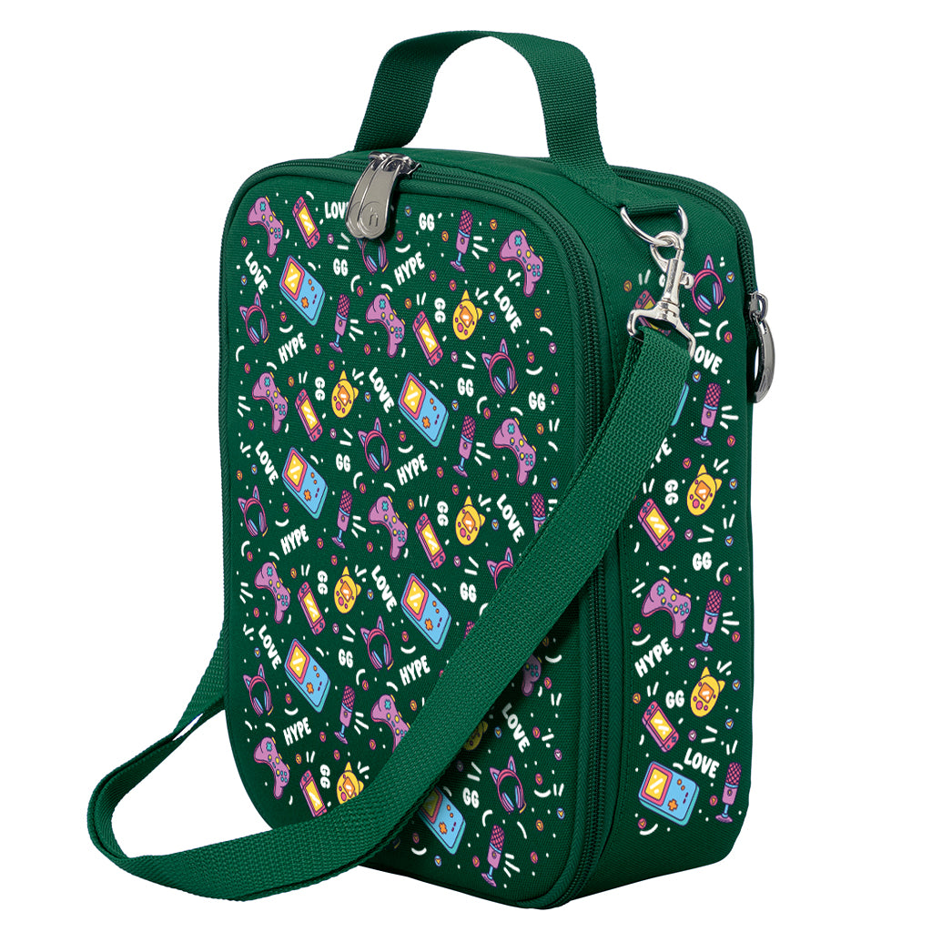 Harlequin Large Lunch bag in Green with Pixel Chick design from the Harlequin Creatix Signature Series. Front angle view displaying top handle, quality zippers and D-Rings with additional shoulder strap.