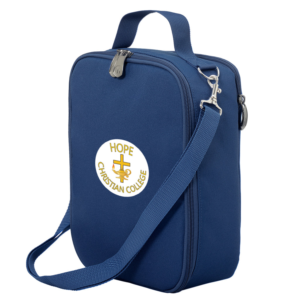 Harlequin lunch bag in navy colour front side angle displaying carry handle and strap, durable water repellent material with Hope Christian College logo