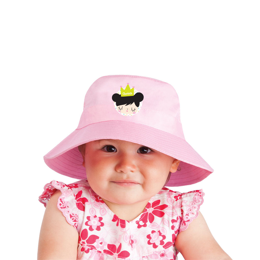 Harlequin pink bucket hat displaying a soft cotton with a wide downwards sloping brim and personalisation