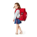 Harlequin Kindy Tuff-Pack Backpack in red, being worn by a 3 years old child model