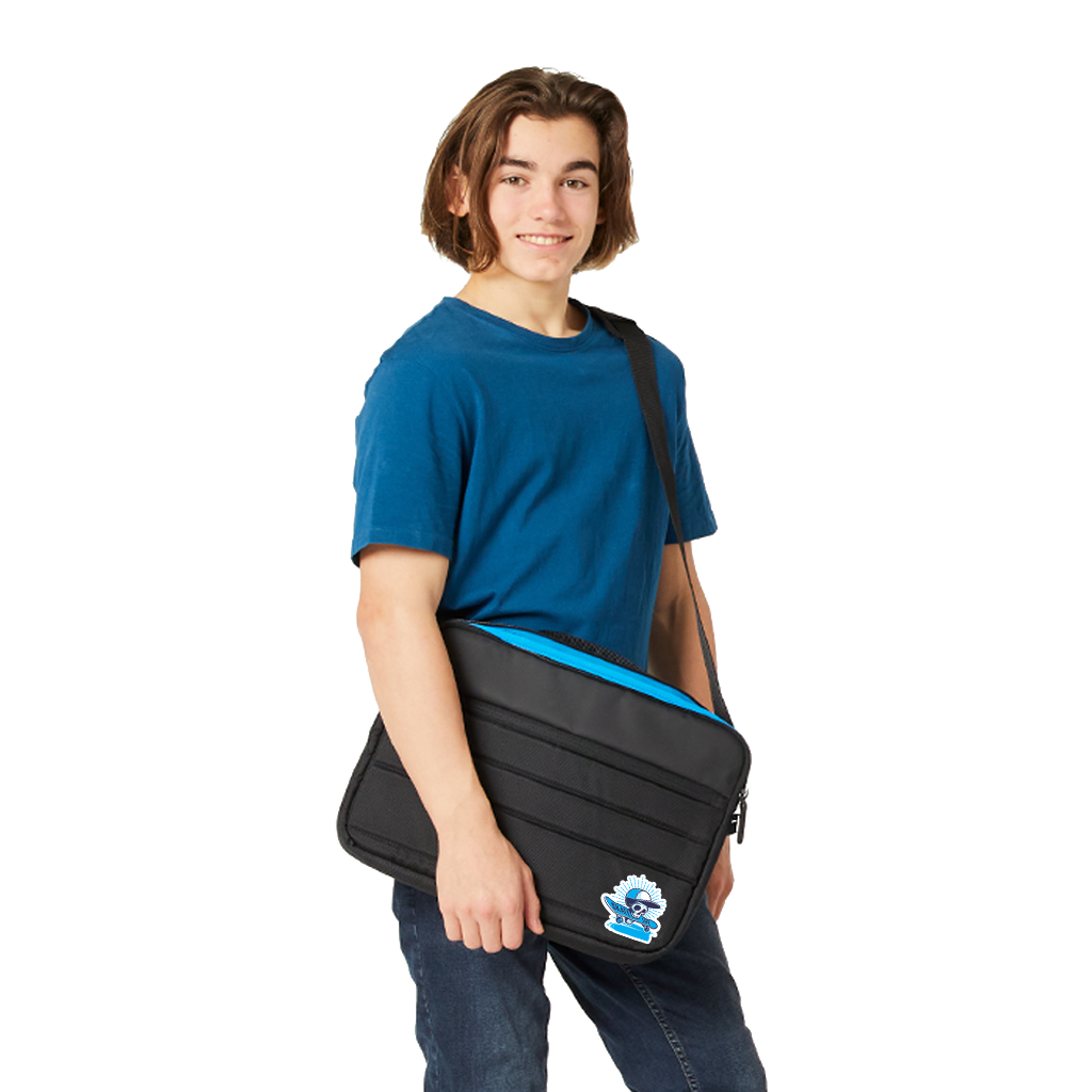 14 year old child model in casual clothes wearing across his left shoulder and held in his right hand the Harlequin Laptop Bag with personalisation.