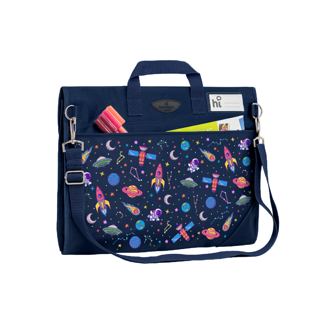 Harlequin Safety Library bag in Navy with Galaxy Girl design from the Harlequin Creatix Signature Series. Back angle view displaying carry handle, D-Rings, name card sleeve, side pocket, reinforced corners and shoulder strap.