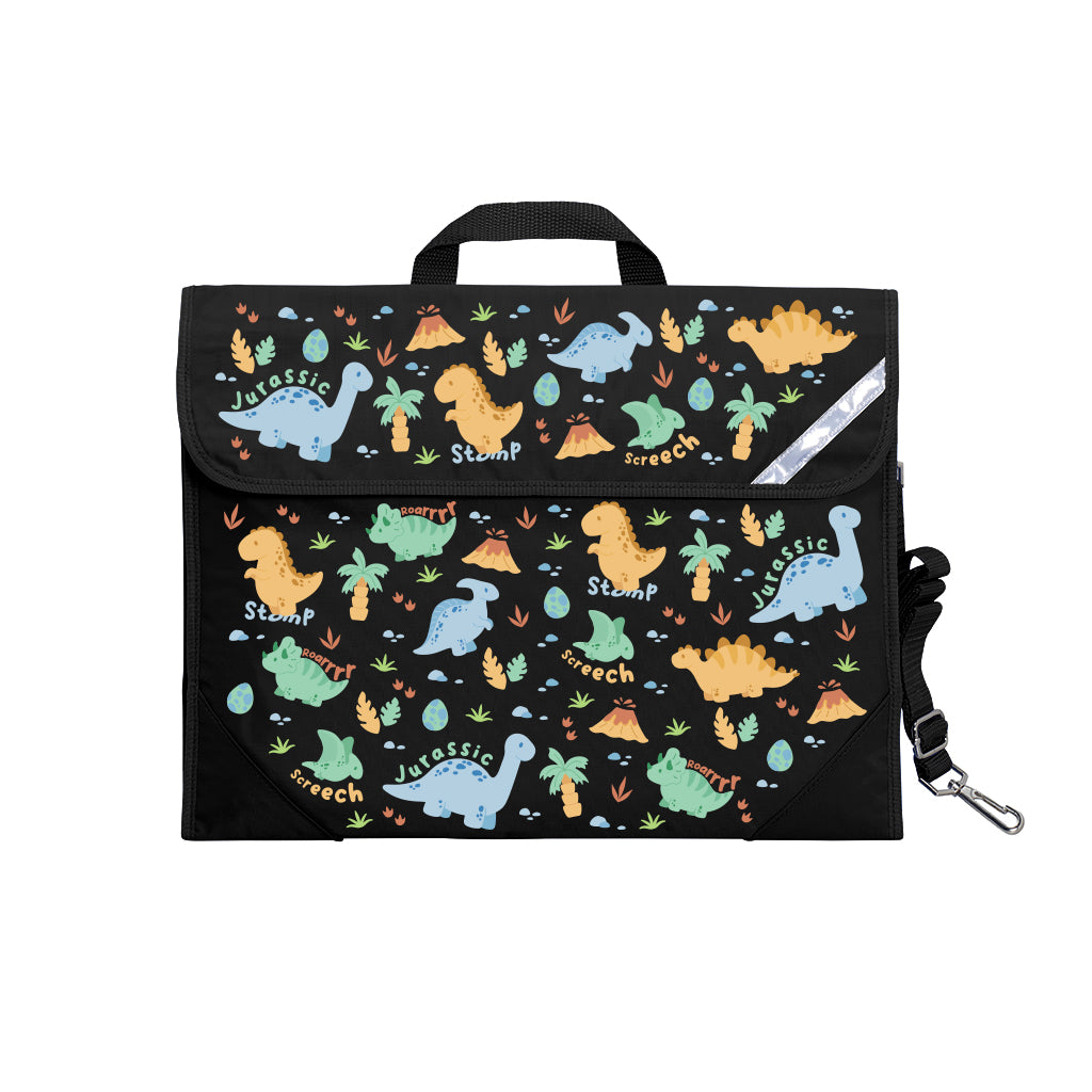 Harlequin Safety Library bag in Black with Jurassic design from the Harlequin Creatix Signature Series. Front angle view displaying carry handle, easy open velcro strap, reflector safety strip, reinforced corners and shoulder strap.