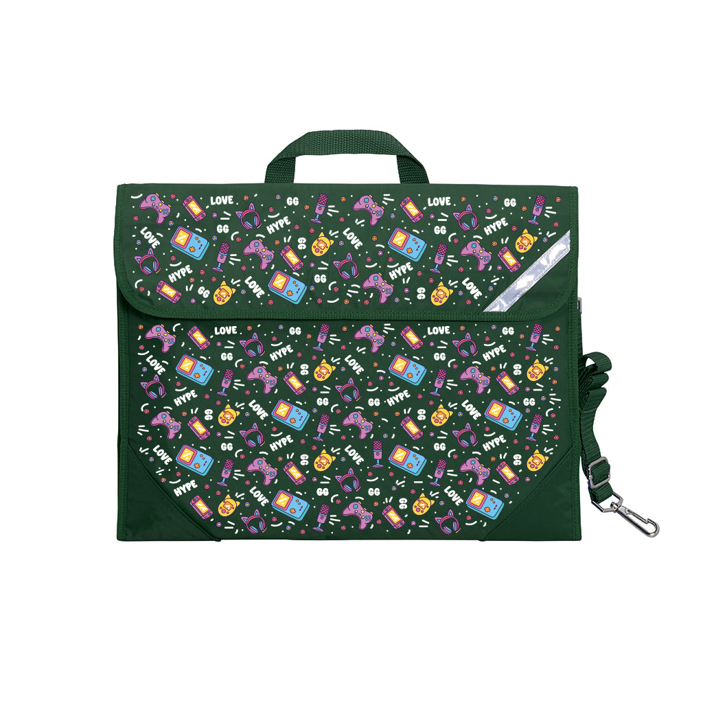 Harlequin Safety Library bag in Green with Pixel Chick design from the Harlequin Creatix Signature Series. Front angle view displaying carry handle, easy open velcro strap, reflector safety strip, reinforced corners and shoulder strap.