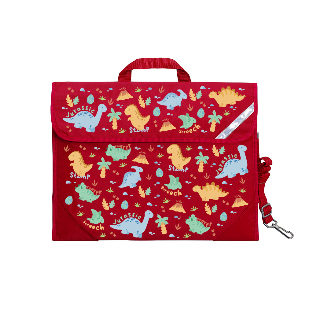 Harlequin Safety Library bag in Red with Jurassic design from the Harlequin Creatix Signature Series. Front angle view displaying carry handle, easy open velcro strap, reflector safety strip, reinforced corners and shoulder strap.