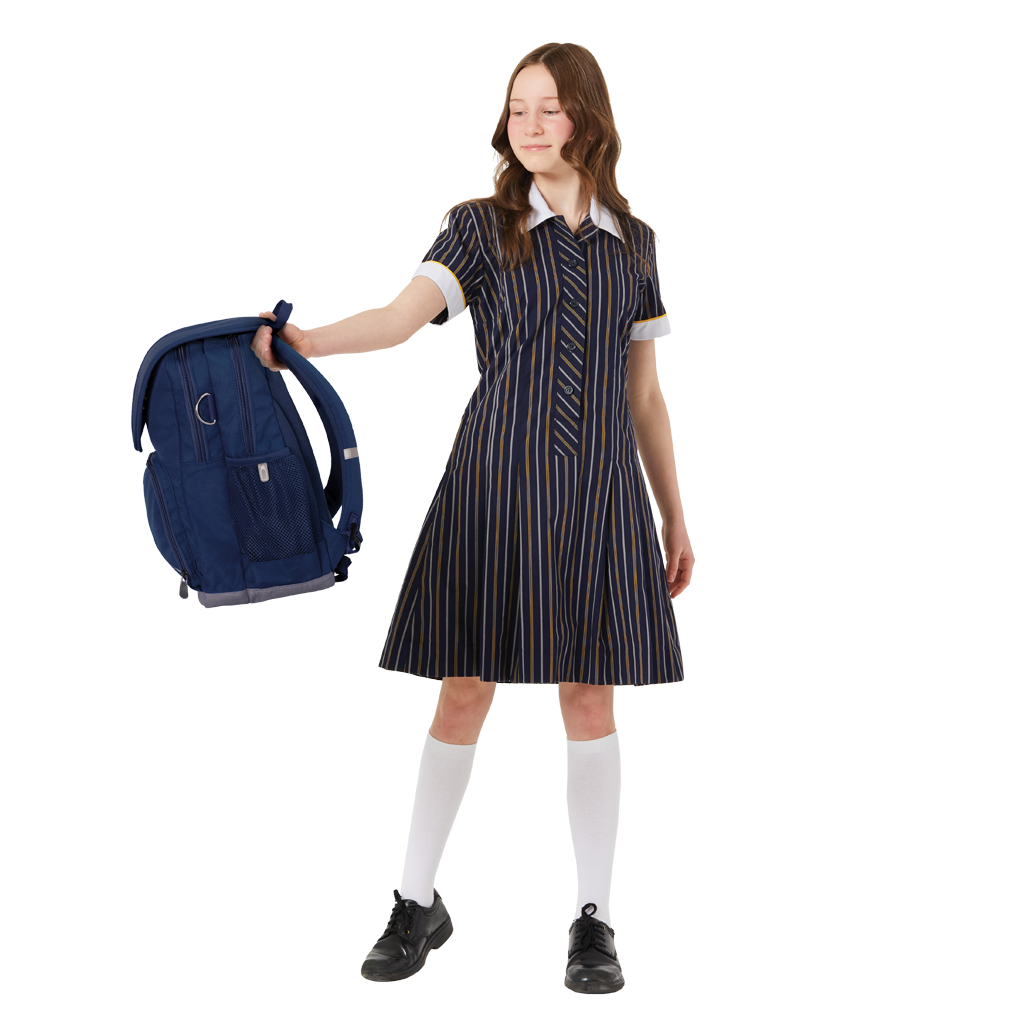 13 year old child model in girl school uniform holding the Ergo Senior backpack in Navy.