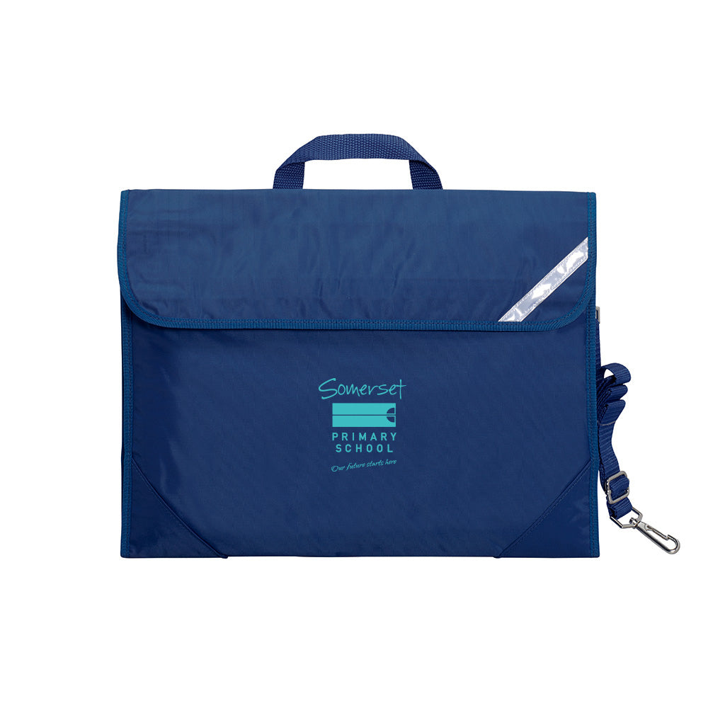 Harlequin Safety Library bag in Navy displaying carry handle, velcro opening, shoulder strap, reflector safety strip, reinforced corners and Somerset Primary School logo
