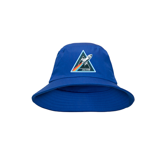A blue bucket school hat with a white and red geometric pattern design on the front.