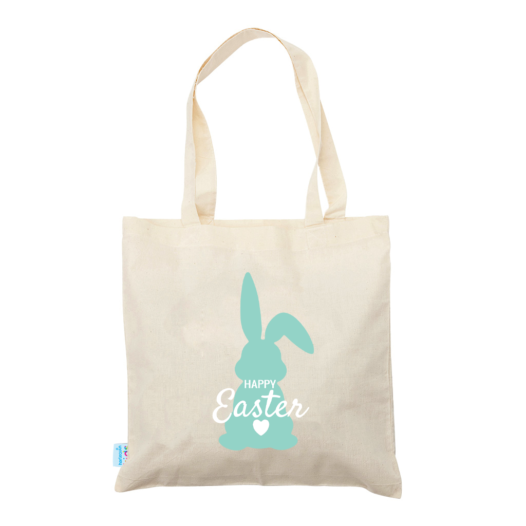 Beige tote bag with a turquoise Easter bunny design and 'Happy Easter' text on a white background
