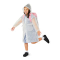 School girl smiling and wearing a transparent raincoat with a hood on a white background.