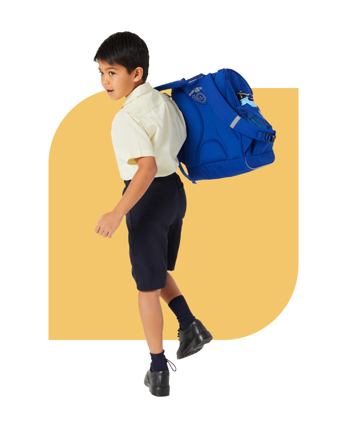 Boy holding blue Harlequin backpack on shoulder with lifetime warranty