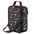 Harlequin Large Lunch bag in Black with Pixel Chick design from the Harlequin Creatix Signature Series. Front angle view displaying top handle, quality zippers and D-Rings with additional shoulder strap.