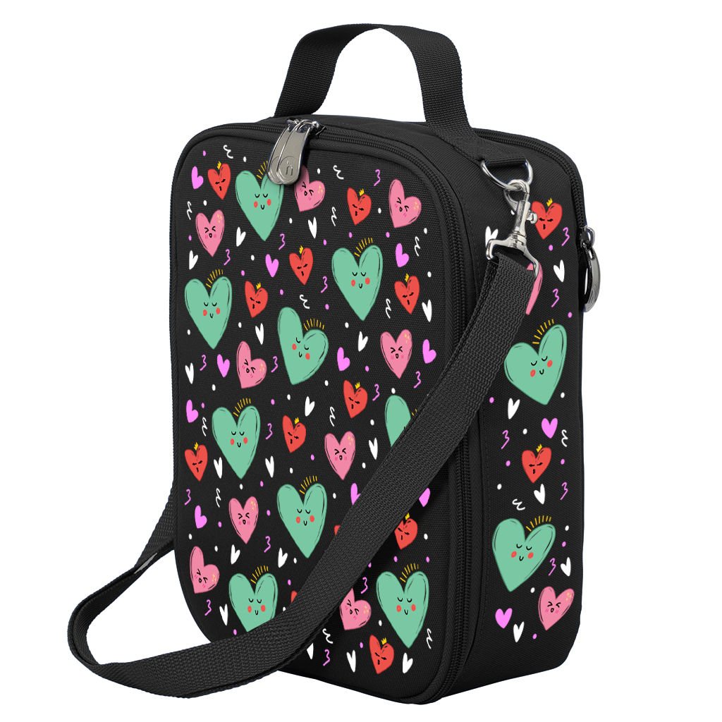 Harlequin Large Lunch bag in Black with Sweet Hearts design from the Harlequin Creatix Signature Series. Front angle view displaying top handle, quality zippers and D-Rings with additional shoulder strap.