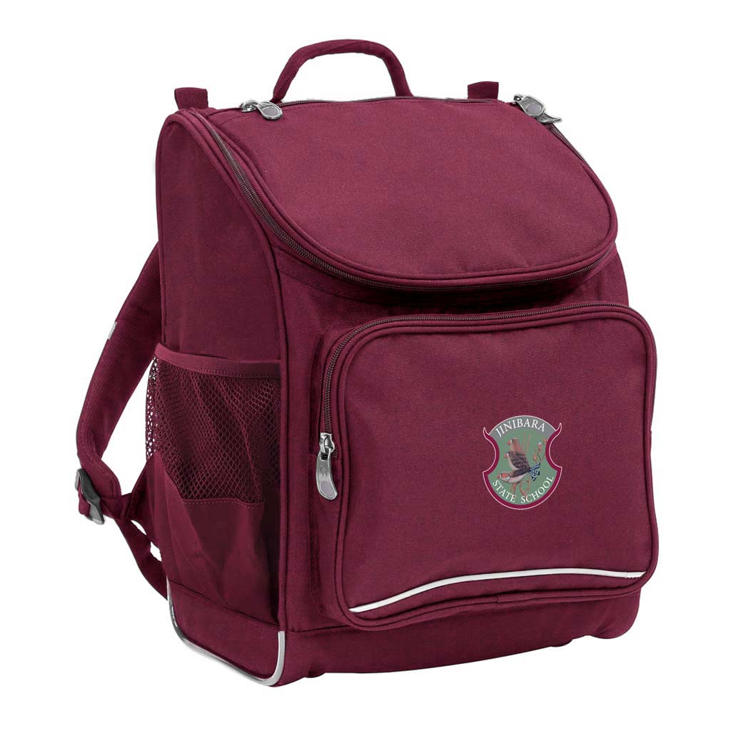 Mighty backpack in colour Maroon, front side angle displaying carry handle, padded shoulder straps, top zipper compartment, front zipper pocket and mesh water bottle holder with Jinibara State School logo