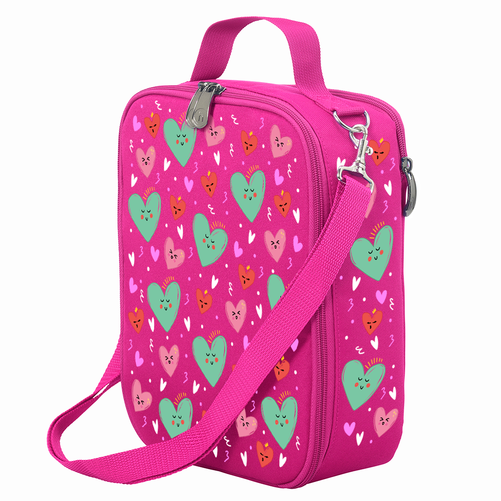 Harlequin Large Lunch bag in Pink with Sweet Hearts design from the Harlequin Creatix Signature Series. Front angle view displaying top handle, quality zippers and D-Rings with additional shoulder strap.