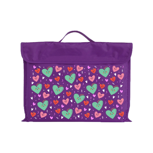 Harlequin Eco Library bag in Purple with Sweet Hearts design from the Harlequin Creatix Signature Series. Front view displaying carry handle, velcro flap opening, and PET recycled water repellent fabric.