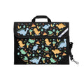 Harlequin Safety Library bag in Black with Jurassic design from the Harlequin Creatix Signature Series. Front angle view displaying carry handle, easy open velcro strap, reflector safety strip, reinforced corners and shoulder strap.