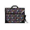 Harlequin Safety Library bag in Black with Pixel Chick design from the Harlequin Creatix Signature Series. Front angle view displaying carry handle, easy open velcro strap, reflector safety strip, reinforced corners and shoulder strap.