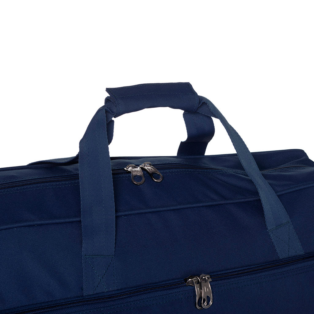 Harlequin sport Bag in Navy Blue zoomed front angle displaying carry handles, top zip compartment and front lower zip compartment