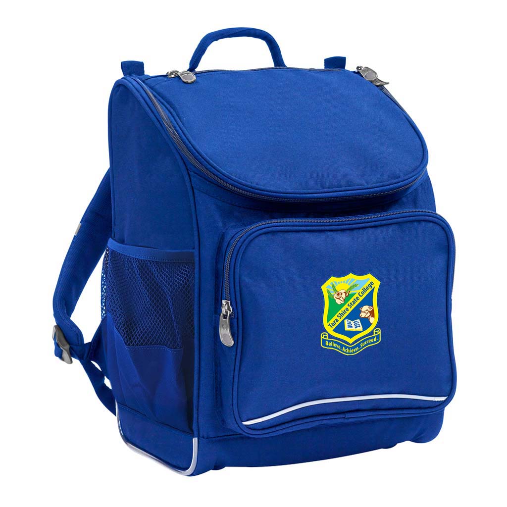 Mighty backpack in colour Royal, front side angle displaying carry handle, padded shoulder straps, top zipper compartment, front zipper pocket and mesh water bottle holder with Tara Shire State College logo