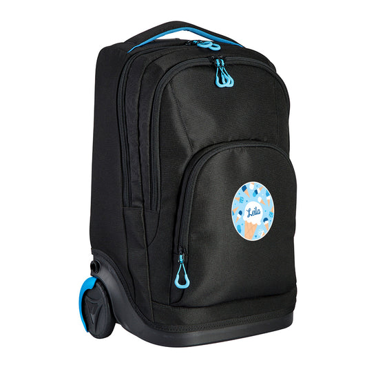 Harlequin black TECH trolley school bag front angled view displaying carry handle with blue padding, two large zip compartments and a front pocket with blue zips, back wheel, and personalisation on the front 